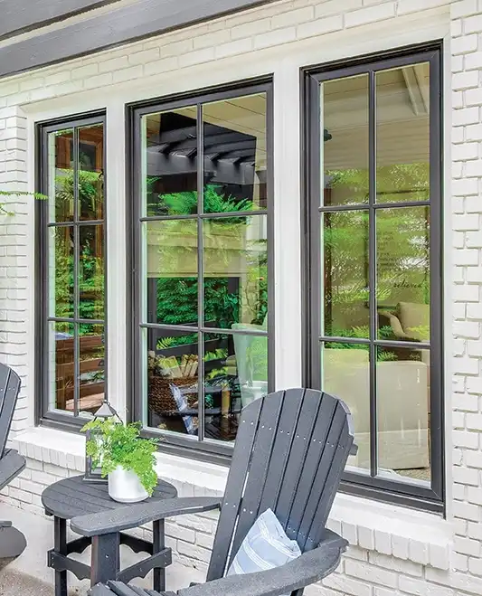 Exterior view of black Marvin Replacement Casement windows.