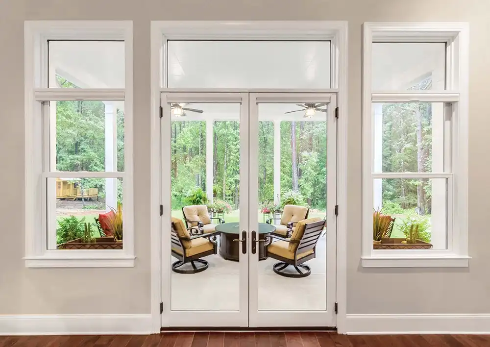 Interior view of a two-panel Marvin Replacement Inswing French door with transom window.