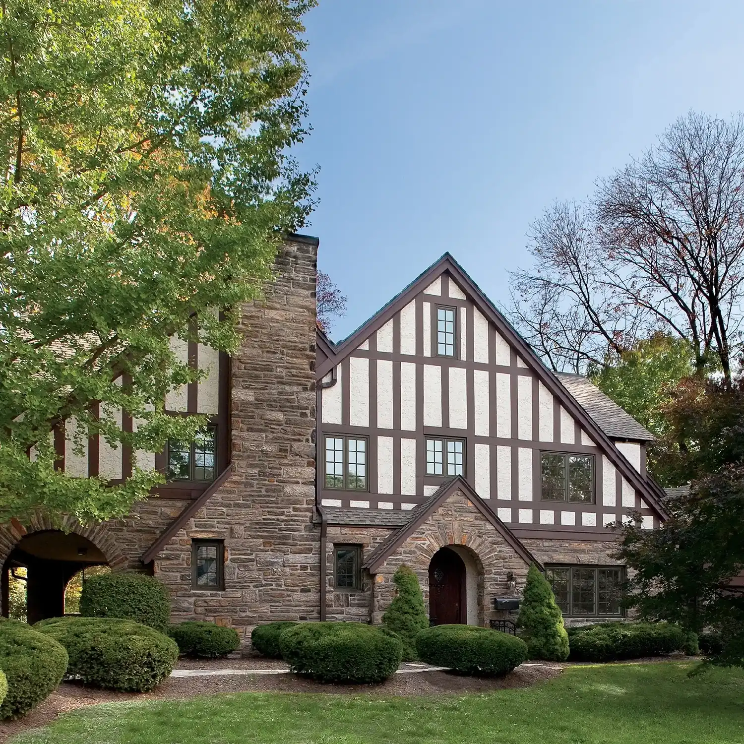 Exterior view of a Tudor style home with Marvin Replacement windows in Philadelphia