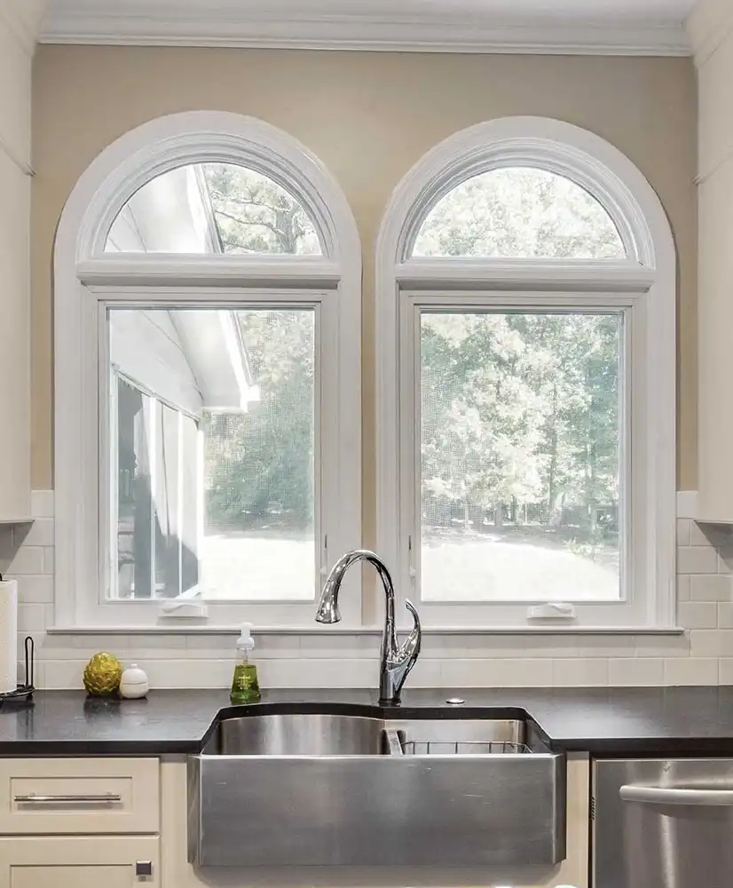 Interior kitchen with Round Top Windows and Casement Windows assembly in Stone White finish.