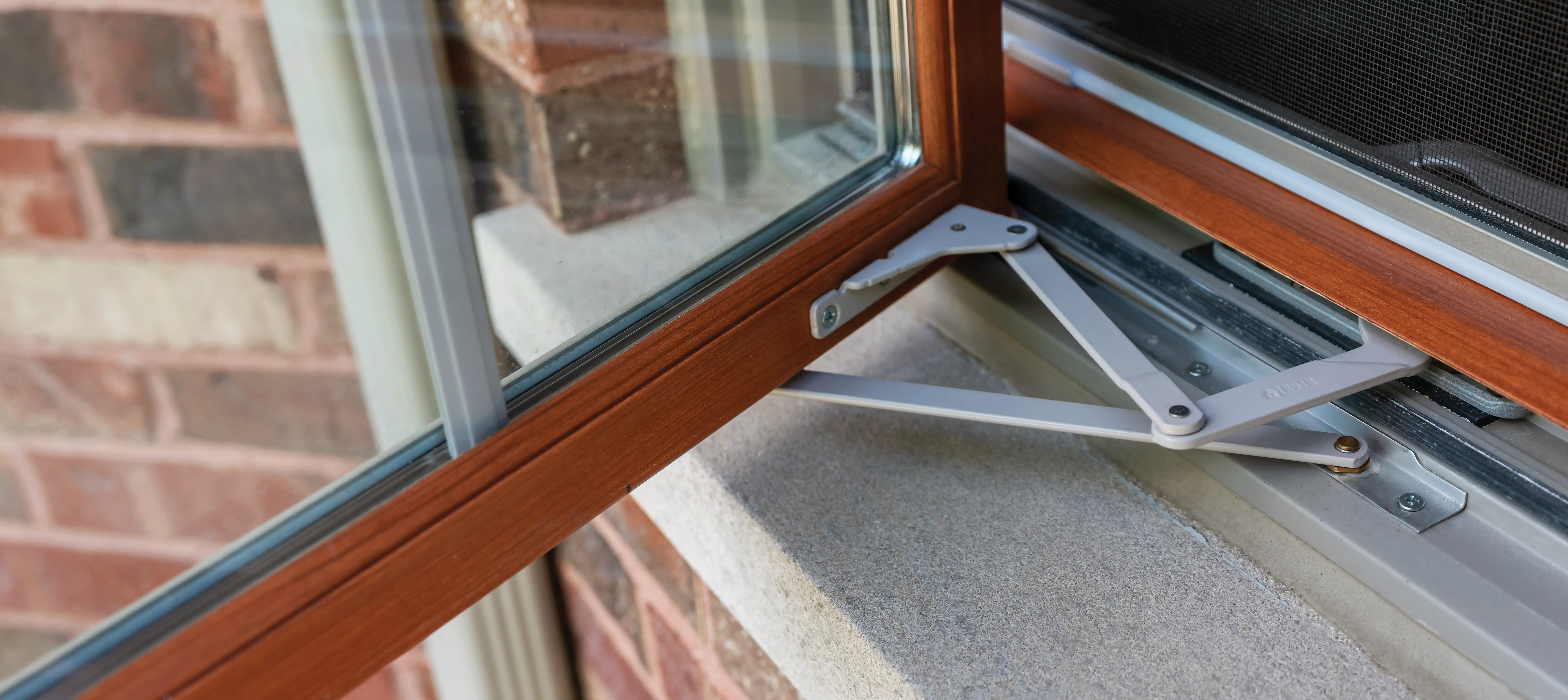 Exterior view of an opened Marvin Replacement casement window.