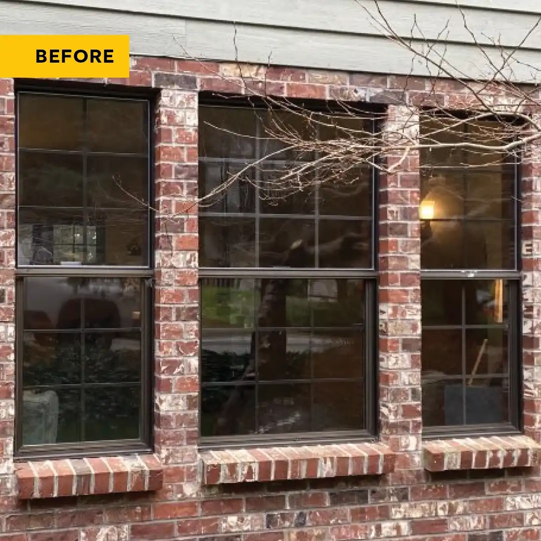 Exterior view of Marvin Replacement Double Hung windows with grilles.