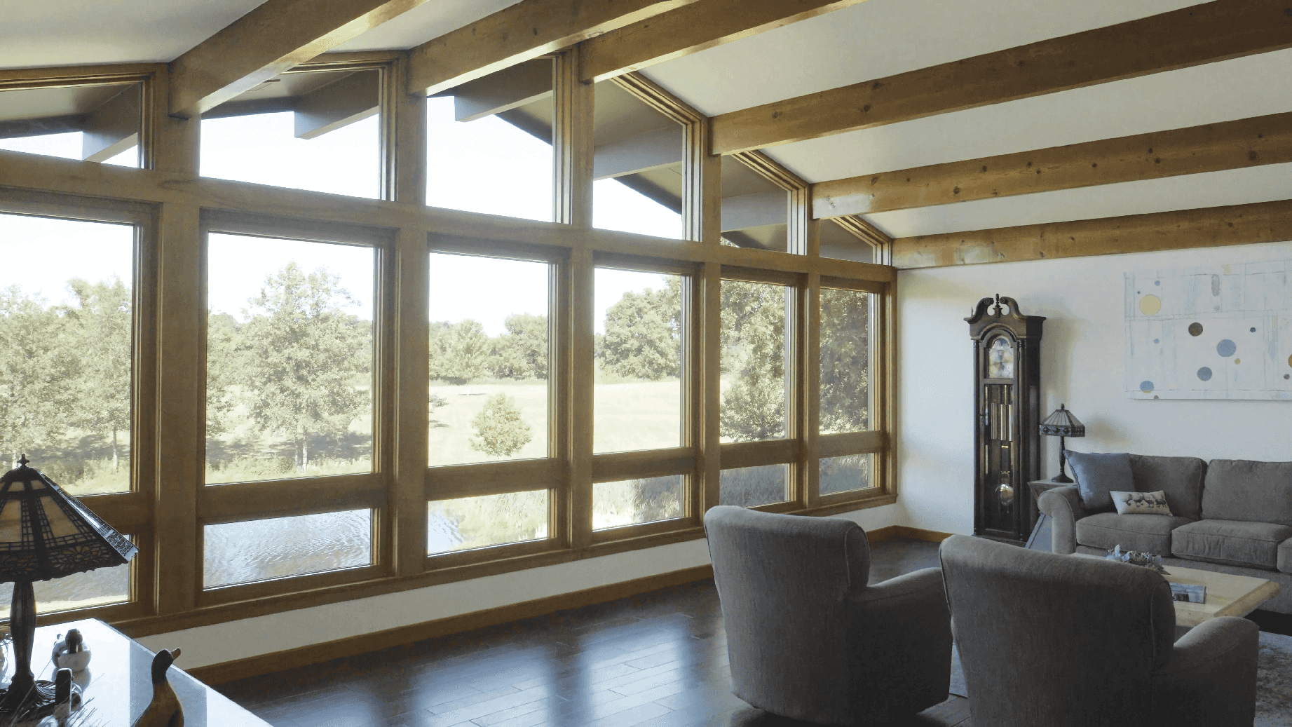 Interior living room image featuring Infinity Polygon Windows in EverWood interior finish.