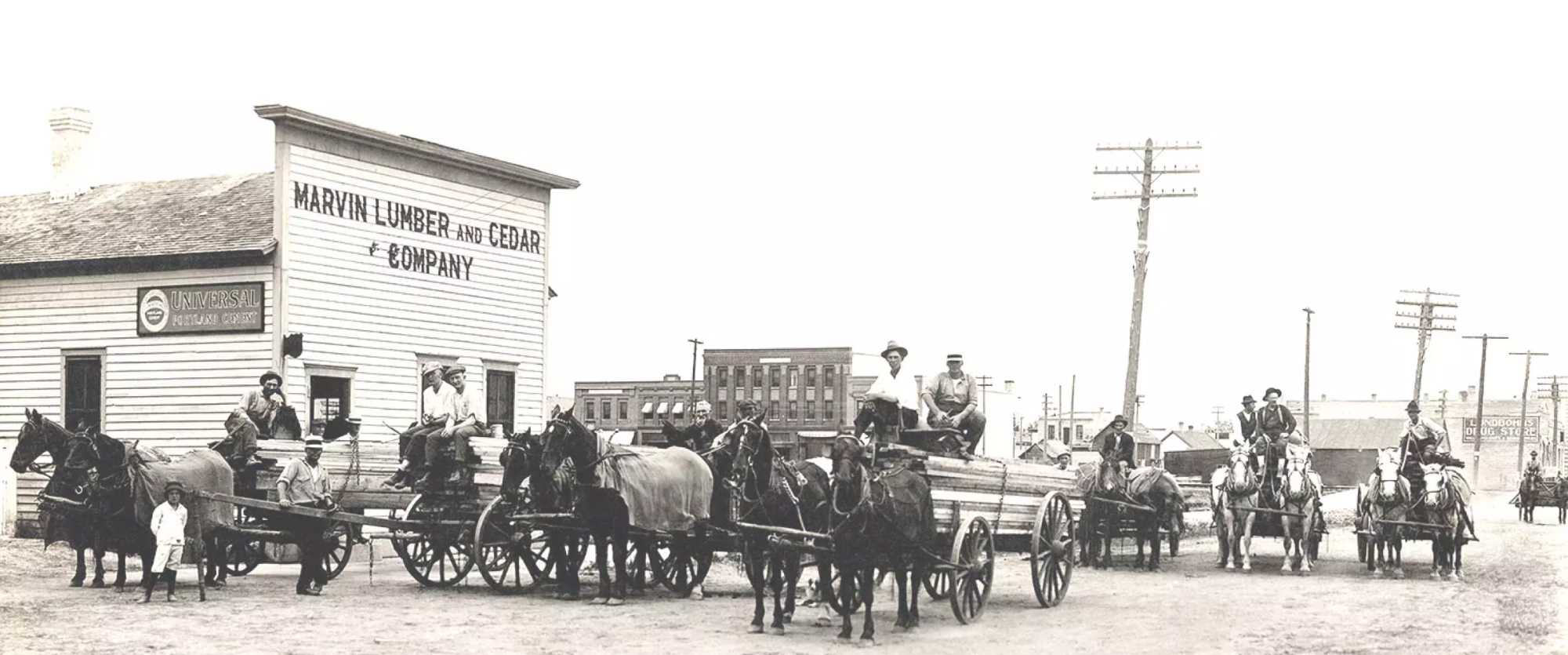 A historical black and white photo showing the original Marvin Lumber & Cedar Company in Warroad.