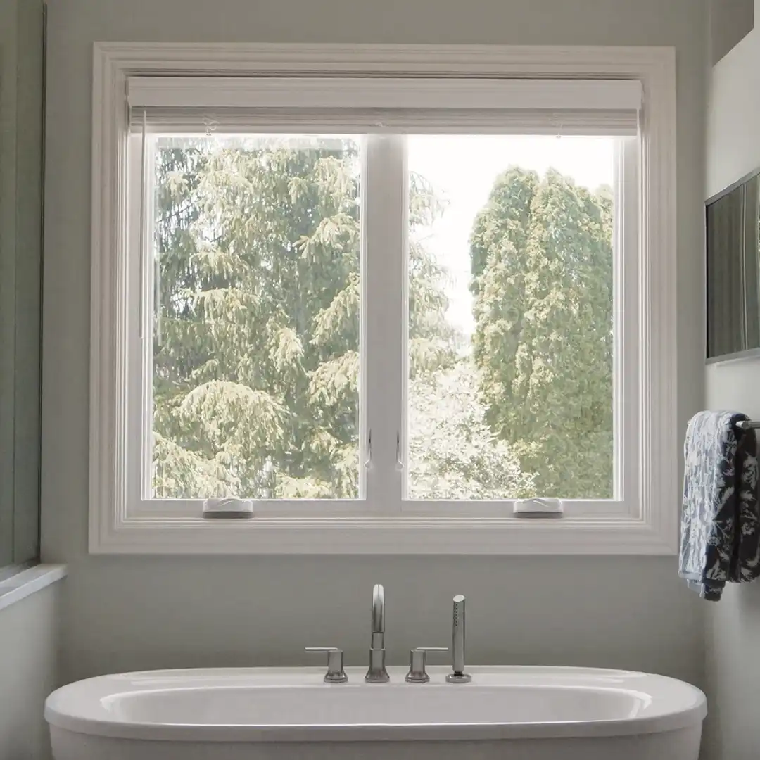 Interior view of a white Marvin Replacement bathroom casement window.