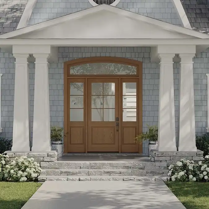 Street view of a TruStile Cape Cod Front Door in Hazelnut color with a four-column entry way.