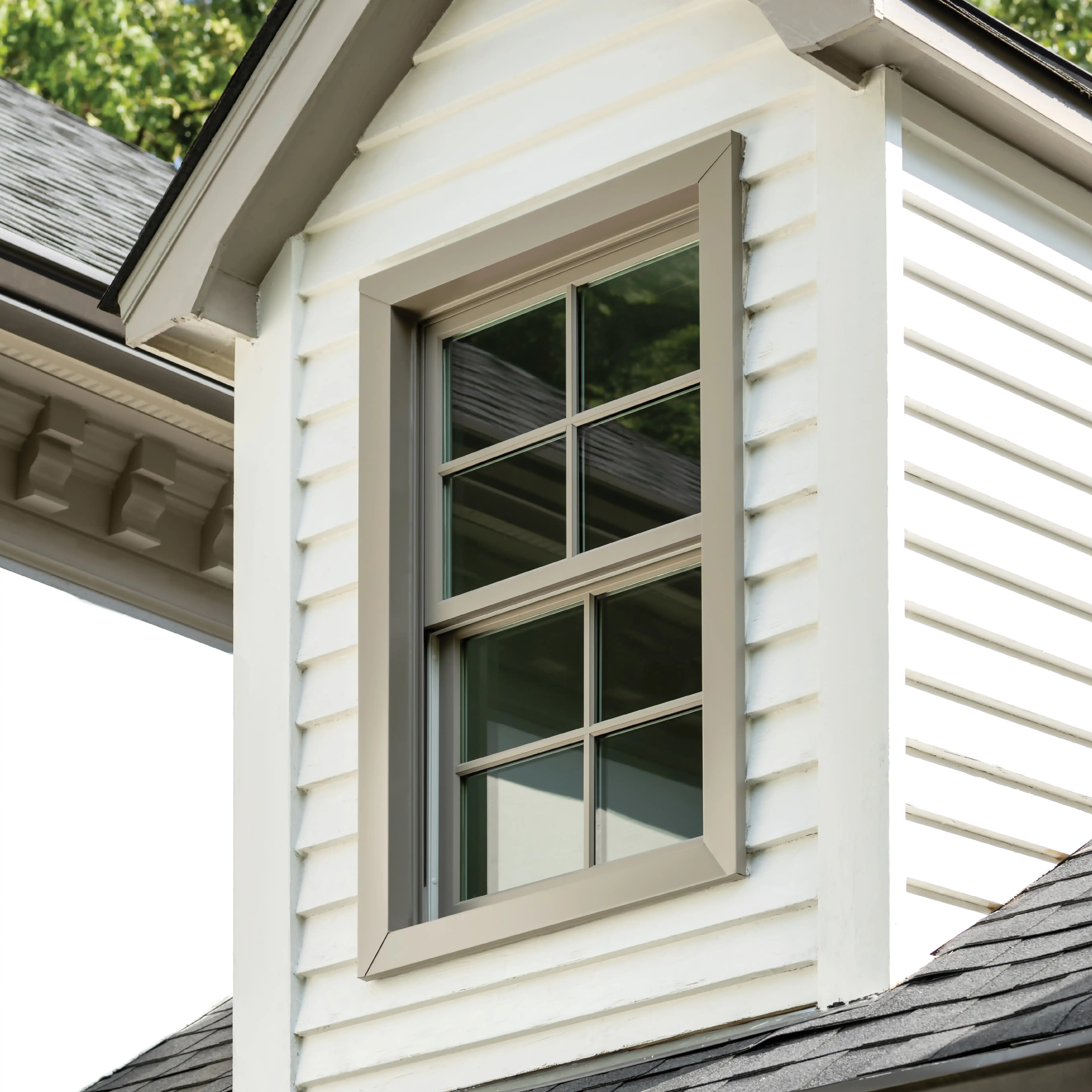 Exterior double hung window in pebble gray